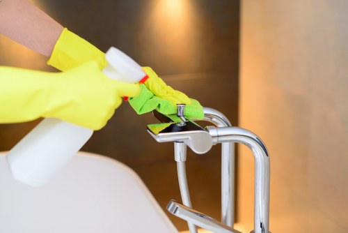 Professional deep cleaning in a modern kitchen with degreasing and sanitizing