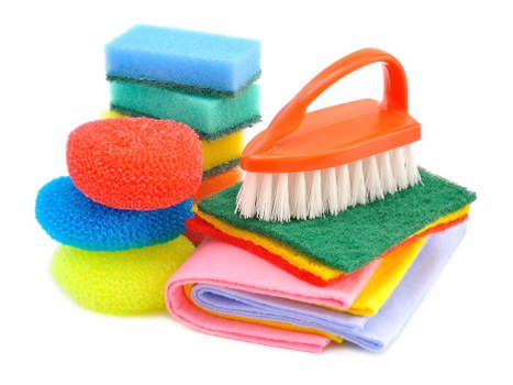 Thorough kitchen deep cleaning around appliances and cabinets